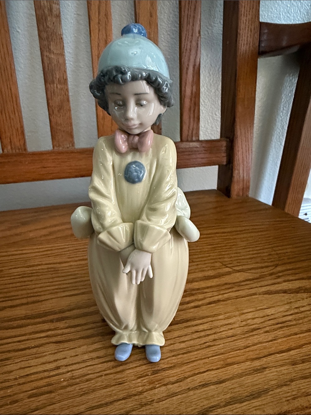 Vintage Porcelain Clown Figurine with Trunk